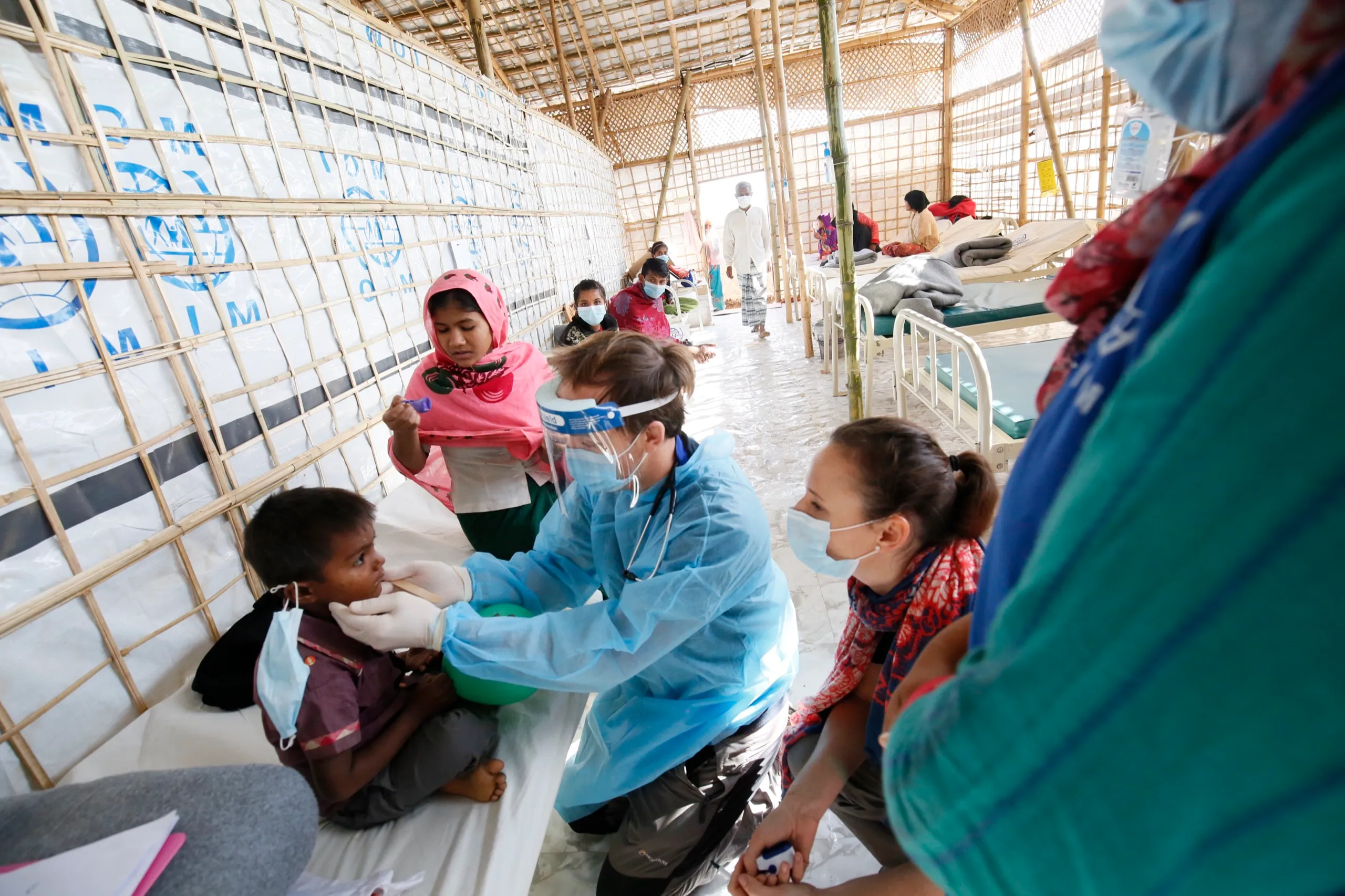 Medical team of doctors and technicians in a bright modern clinic